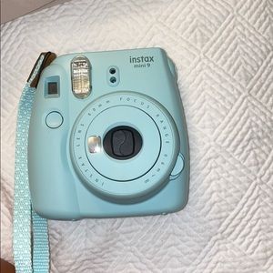 Blue polaroid camera
